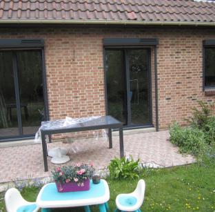 Rénovation énergétique d'une maison des année 80 avec des menuiseries aluminium